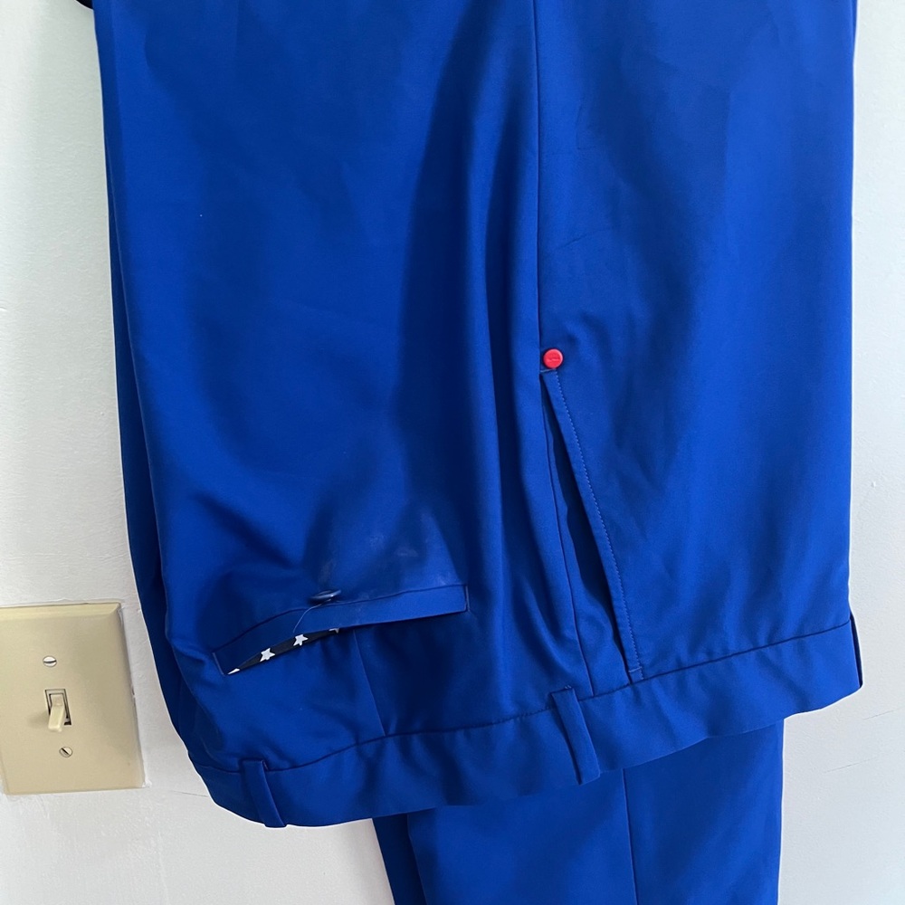Blue Pants with Star and Red Button Accents